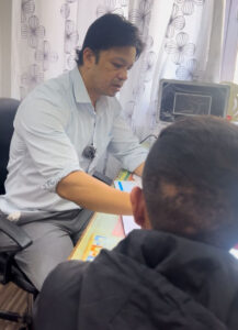 Professional dermatology consultation showing doctor-patient interaction while developing customized skin treatment protocol